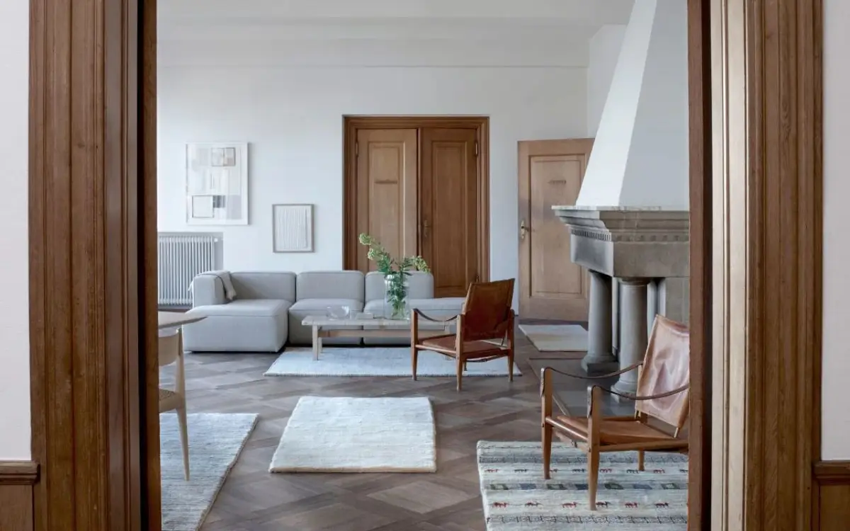 Rugs helping define spaces while maintaining an open layout