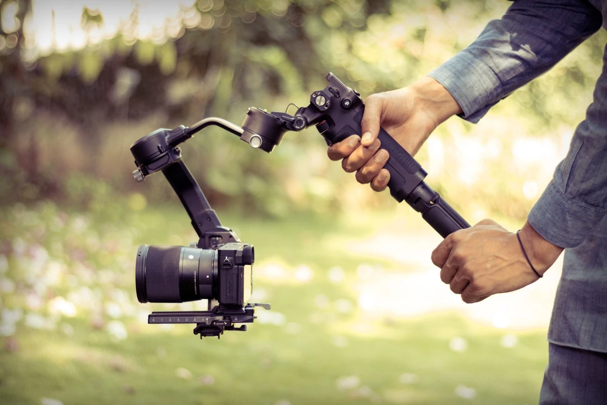 A gimbal is like a robot assistant that holds your camera steady while you move