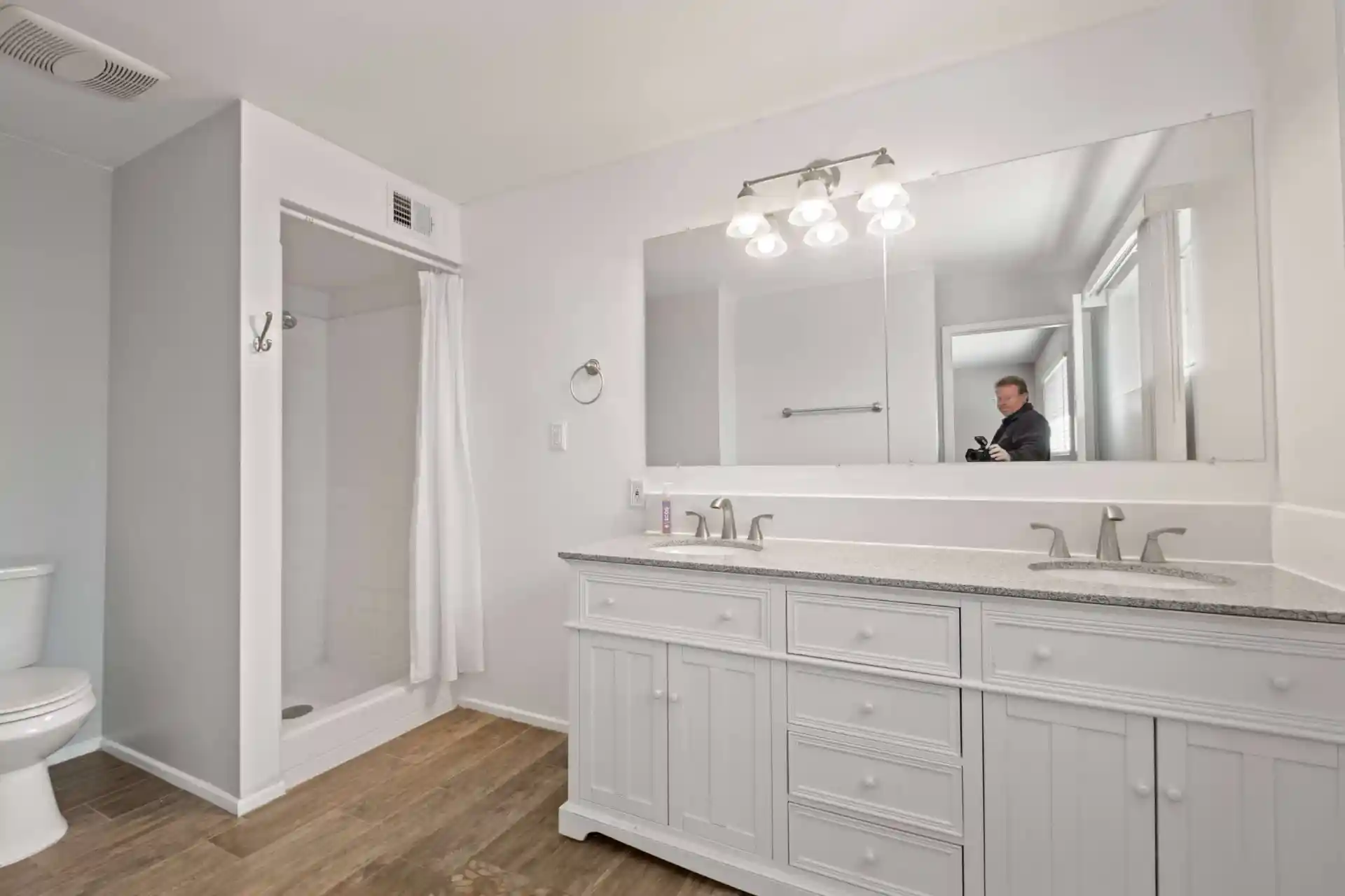 After removing photographer’s reflection in real estate photo editing